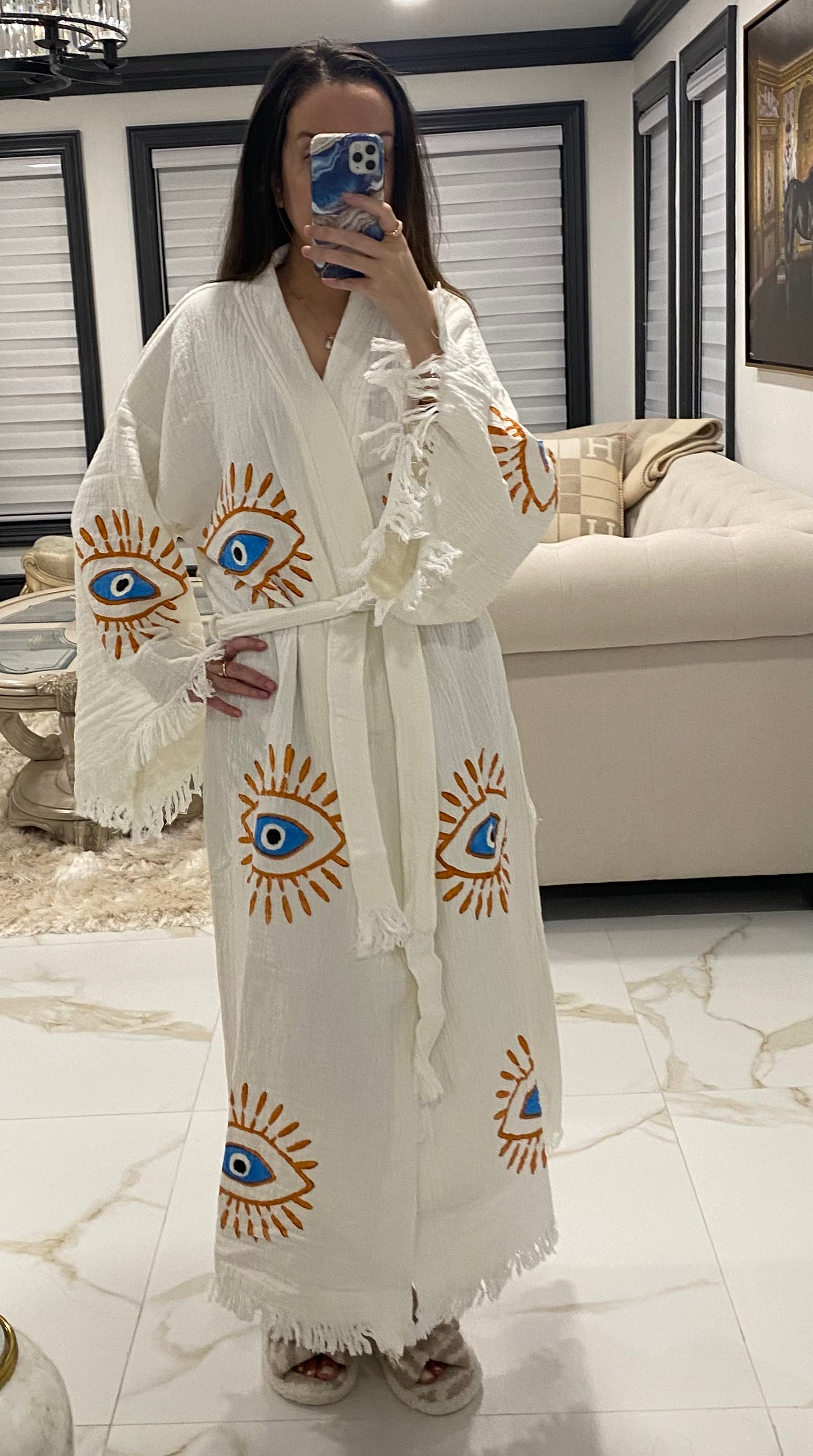 White Robe Gold Evil Eye