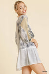 white tunic dress with lace and flowers