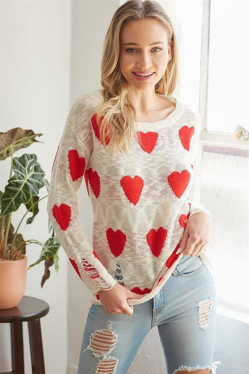 White and red heart distressed sweater