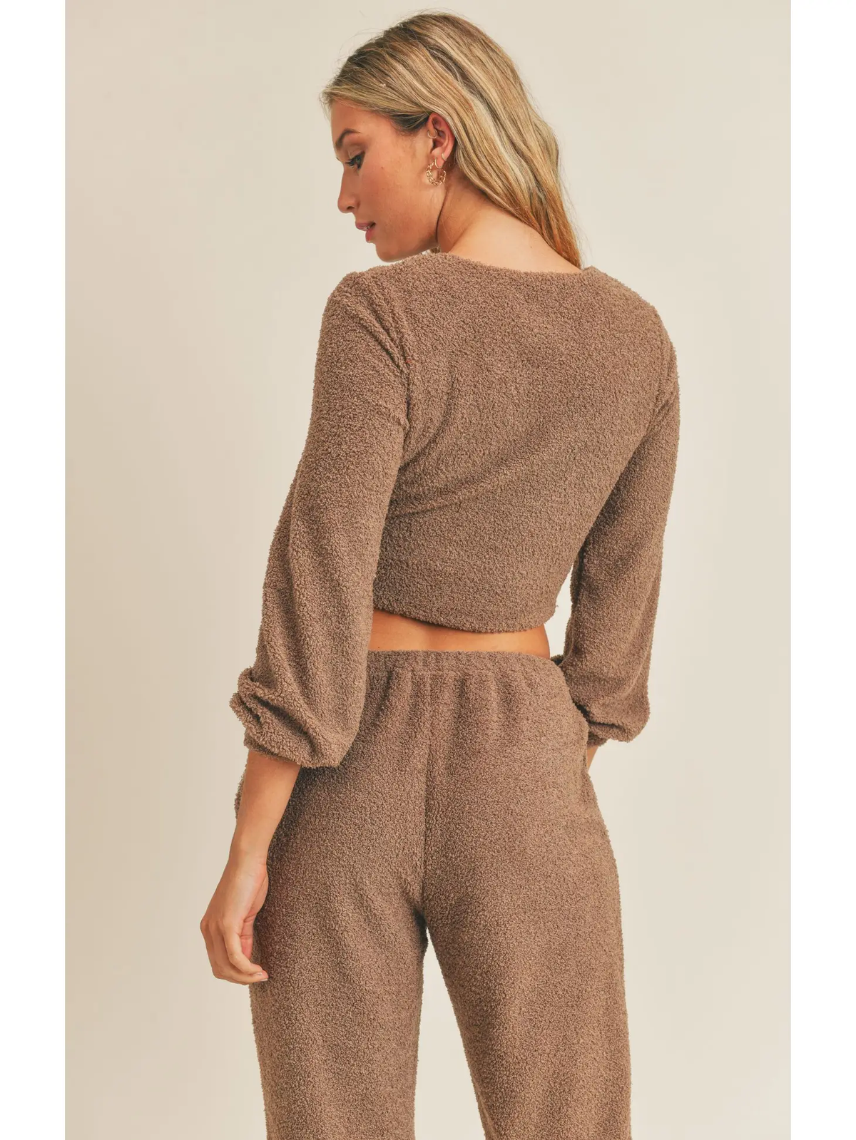 Brown criss cross fuzzy top