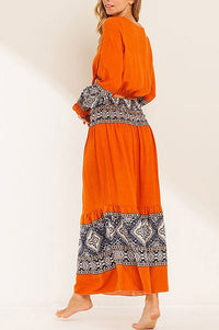 Orange long sleeve crop top and skirt set