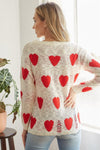 White and red heart distressed sweater